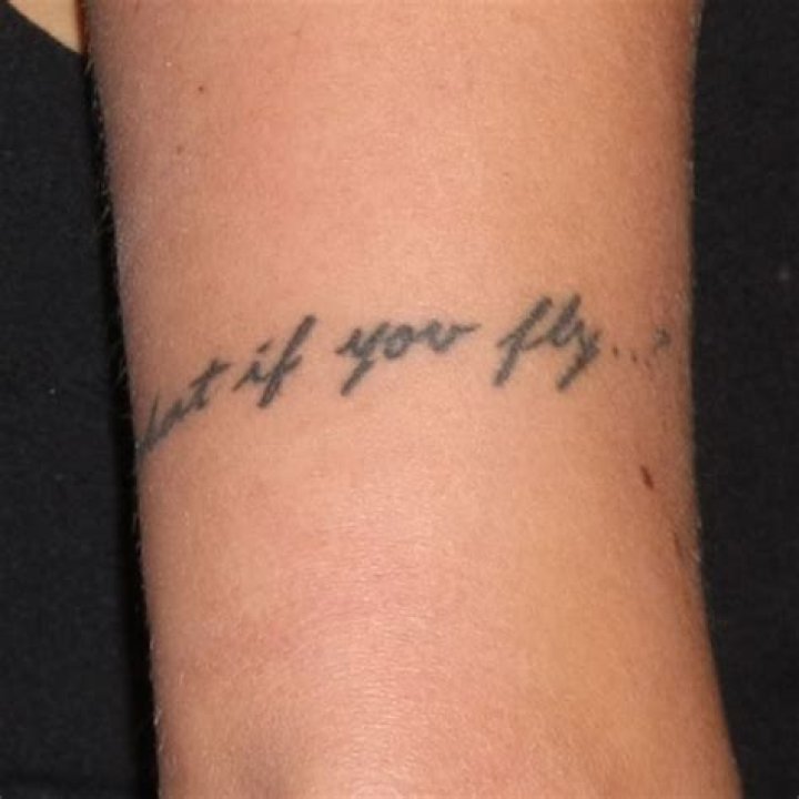 Janel Parrish "Love Conquers All" Latin Shoulder Tattoo